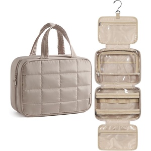 image:imageBAGSMART Travel Toiletry Bag with Jewelry Organizer Hanging Travel Bag for Toiletries Puffy Makeup Cosmetic Bag Organizer Carryon Travel Accessories Essentials BlackLCamel3