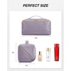 image:imageBAGSMART Travel Makeup Bag for Women Portable Waterresistant Cosmetic Case Puffy Padded Make Up Organizer Pouch Open Flat Toiletry Bag for Toiletries Brushes PinkAPurple