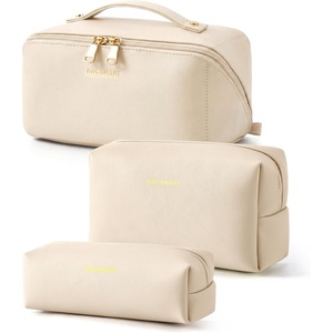 image:imageBAGSMART Makeup Bag Travel Cosmetic Bag Large Make Up Bag Flat Open Toiletry Bag for Women PU Leather Travel Essentials Organizer Case Wideopen Pouch Purse for Skincare Brushes Classic Brown38Cream Beige