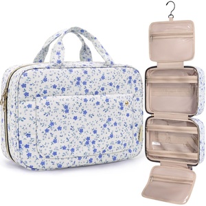 image:imageBAGSMART Toiletry Bag Travel Bag with Hanging Hook Waterresistant Makeup Cosmetic Bag Travel Organizer for Accessories Shampoo Fullsize Container Toiletries Black MediumBlue Ditsy Floral
