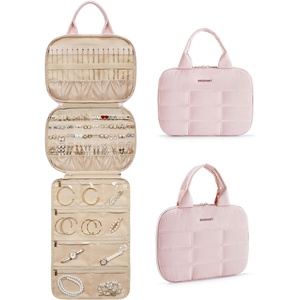 image:imageBAGSMART Travel Jewelry Case Hanging Jewelry Organizer with Zipper Pockets Large Capacity Puffy Jewelry Roll for Earrings Necklaces Rings on Closet Wall Door Portable Travel Essentials PinkPink