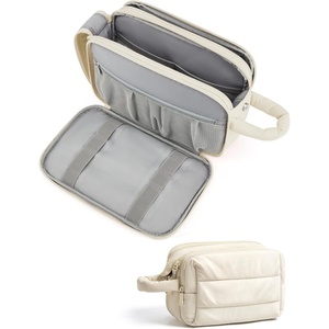 image:imageBAGSMART Travel Toiletry Bag for Women Wideopen Makeup Bag Organizer Puffy Make Up Case Large Capacity Cosmetic Organizer for Women for Travel Essentials Toiletries Accessories BottlesBlackWarm Beige